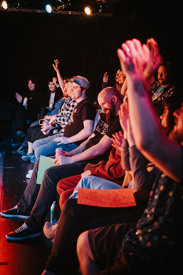people sitting at a performance